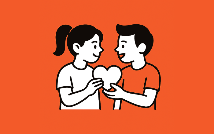 Dos estudiantes sostienen un corazón juntos, simbolizando la educación para la sexualidad, el respeto y la construcción de ciudadanía.